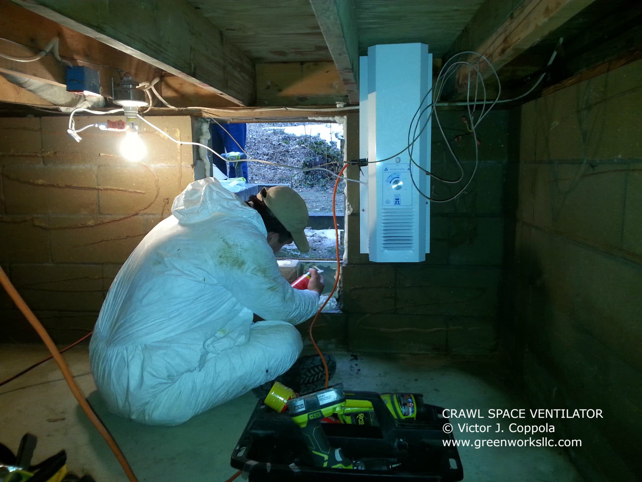 Expert fixing ventilation in a crawl space for moisture management